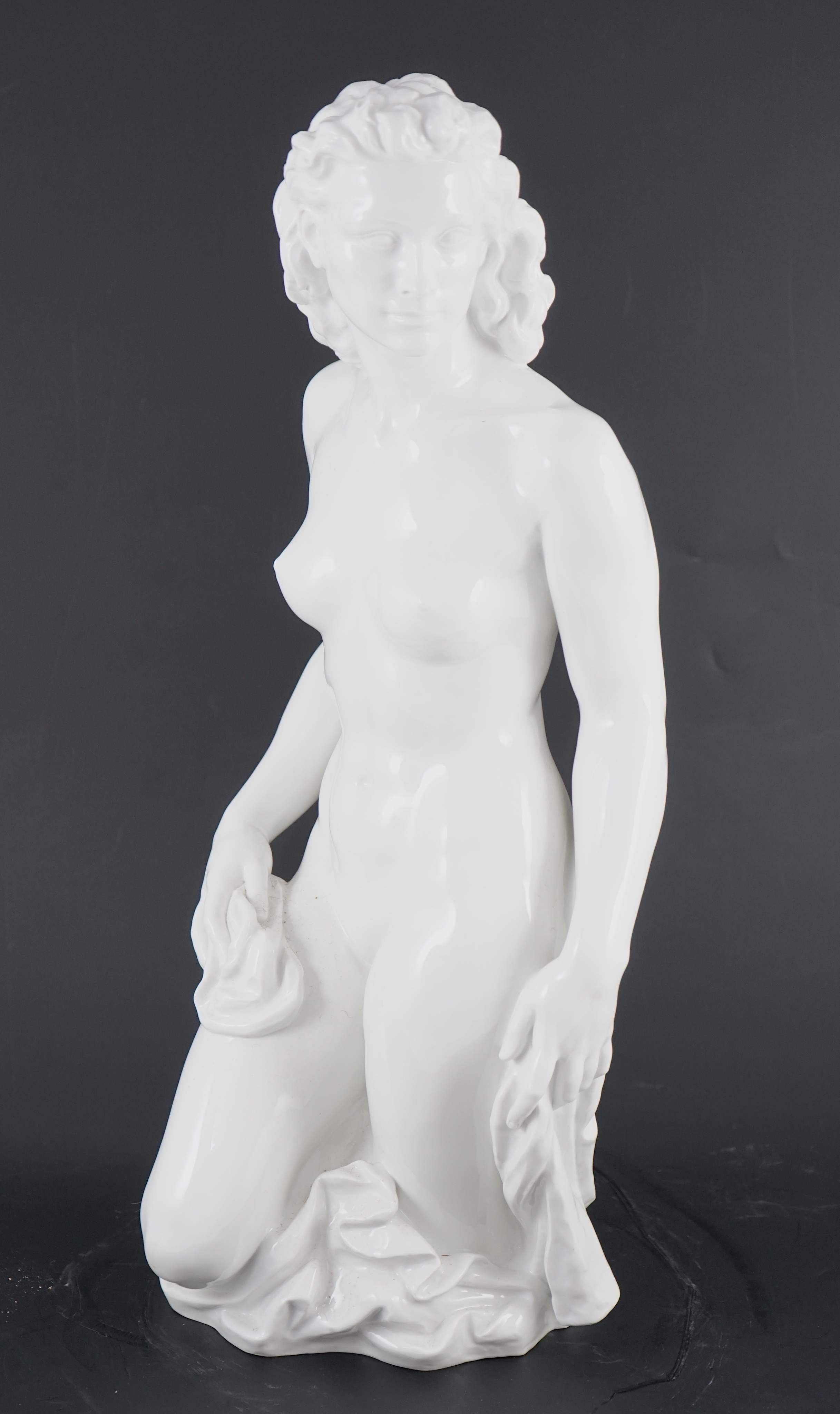 Robert Ullmann (1903-1966) for Meissen, a large white glazed porcelain three-quarter length figure of a nude woman, 50.5cm high